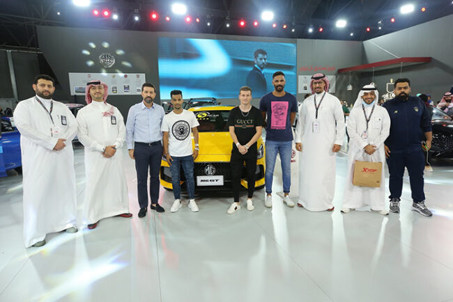 تفاعل رياضي كبير مع نخبة لاعبي النادي الأهلي خلال مشاركة إم جي السعودية في معرض جدة الدولي للسيارات تفاعل رياضي كبير مع نخبة لاعبي النادي الأهلي خلال مشاركة إم جي السعودية في معرض جدة الدولي للسيارات