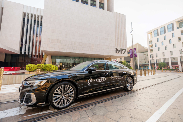 Driven by progress. Audi Qatar drives Qatar Creates