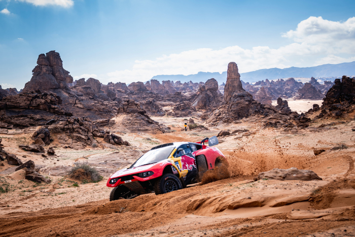 Loeb edges out legend Peterhansel in thrilling Stage Four car duel