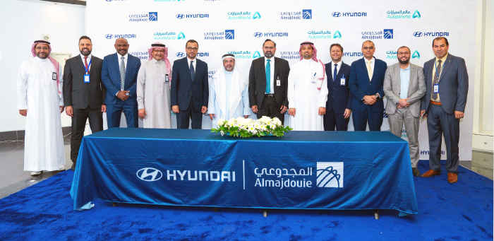 An agreement between Almajdouie Automotive Co. And Auto World to supply more than 1,100 vehicles