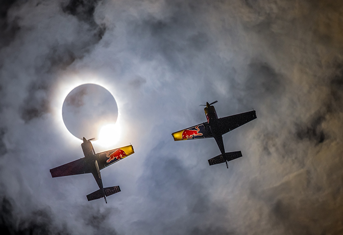 Red Bull Aerobatic Pilots Fly Through Rare Solar Eclipse, Creating Once-in-a-Lifetime Photos